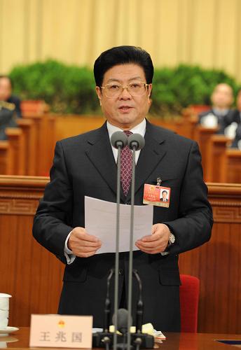 3月9日,十一屆全國人大二次會議在北京人民大會堂舉行第二次全體會議。王兆國主持會議。 新華社記者馬占成攝