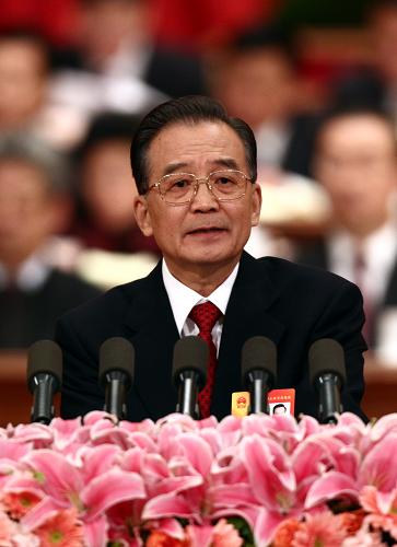3月5日,第十一屆全國人民代表大會(huì)第三次會(huì)議在北京人民大會(huì)堂開幕。國務(wù)院總理溫家寶作政府工作報(bào)告。 新華社記者姚大偉攝