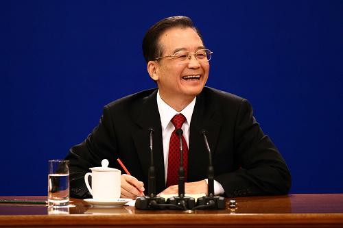 3月14日,國務(wù)院總理溫家寶在北京人民大會堂與中外記者見面,并回答記者提問。 新華社記者姚大偉 攝