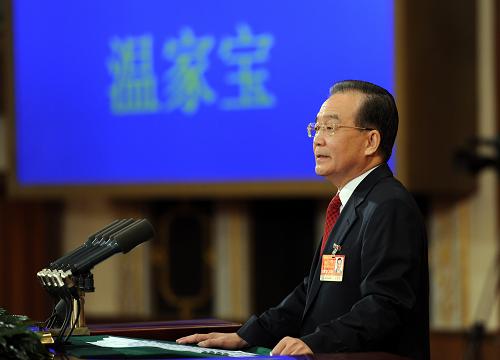 3月5日,第十一屆全國(guó)人民代表大會(huì)第四次會(huì)議在北京人民大會(huì)堂開(kāi)幕。國(guó)務(wù)院總理溫家寶作政府工作報(bào)告。 新華社記者馬占成攝