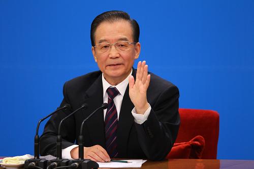 3月14日,國務院總理溫家寶在北京人民大會堂與中外記者見面,并回答記者提問。 新華社記者 陳建力 攝