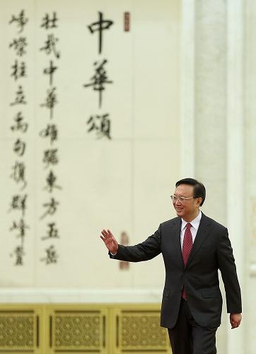 3月9日,十二屆全國人大一次會議在北京人民大會堂舉行記者招待會,外交部長楊潔篪回答中外記者提問。這是楊潔篪步入會場。新華社記者 王申 攝