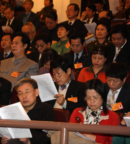 3月5日,第十一屆全國人民代表大會第一次會議在北京人民大會堂開幕。這是全國政協(xié)委員列席開幕會。 新華社記者 王建民 攝