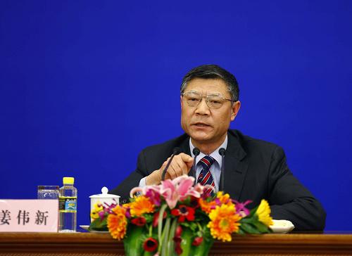 這是姜偉新在回答記者提問。新華社記者陳建力攝