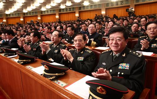 3月14日,第十一屆全國(guó)人民代表大會(huì)第三次會(huì)議在北京人民大會(huì)堂舉行閉幕會(huì)。這是全國(guó)人大代表在鼓掌。新華社記者 劉衛(wèi)兵 攝