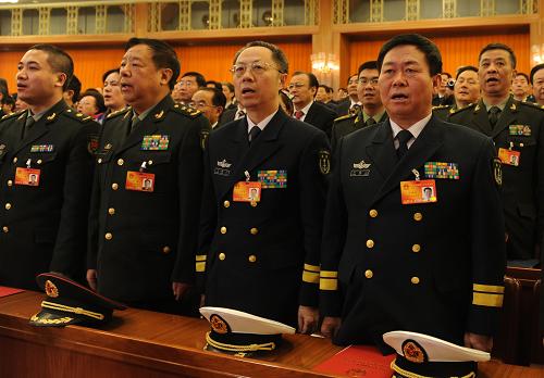 3月14日,第十一屆全國(guó)人民代表大會(huì)第三次會(huì)議在北京人民大會(huì)堂舉行閉幕會(huì)。這是全國(guó)人大代表在高唱國(guó)歌。新華社記者 陳樹(shù)根攝