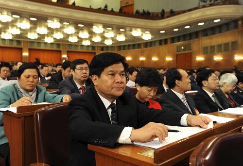 3月11日,十一屆全國(guó)人大三次會(huì)議在北京人民大會(huì)堂舉行第四次全體會(huì)議。這是代表在認(rèn)真聽(tīng)會(huì)。新華社記者 陳樹(shù)根 攝