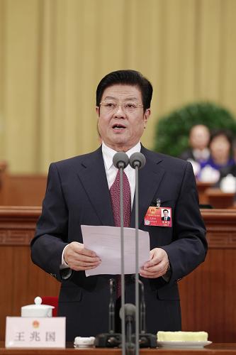 3月9日,十一屆全國人大五次會議在北京人民大會堂舉行第三次全體會議。全國人大常委會副委員長王兆國主持會議。新華社記者 鞠鵬 攝
