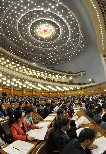 3月9日,十一屆全國人大五次會議在北京人民大會堂舉行第三次全體會議。新華社記者 楊宗友 攝