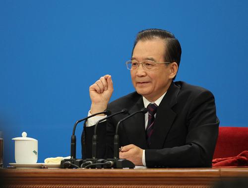 3月14日,國(guó)務(wù)院總理溫家寶在北京人民大會(huì)堂與中外記者見(jiàn)面,并回答記者提問(wèn)。 新華社記者 劉衛(wèi)兵 攝
