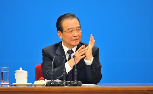 3月14日,國(guó)務(wù)院總理溫家寶在北京人民大會(huì)堂與中外記者見(jiàn)面,并回答記者提問(wèn)。 新華社記者 黃敬文 攝