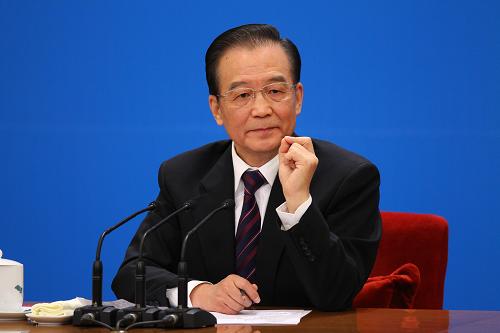 3月14日,國務院總理溫家寶在北京人民大會堂與中外記者見面,并回答記者提問。 新華社記者 陳建力 攝