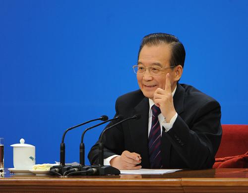 3月14日,國務院總理溫家寶在北京人民大會堂與中外記者見面,并回答記者提問。 新華社記者 王建華 攝