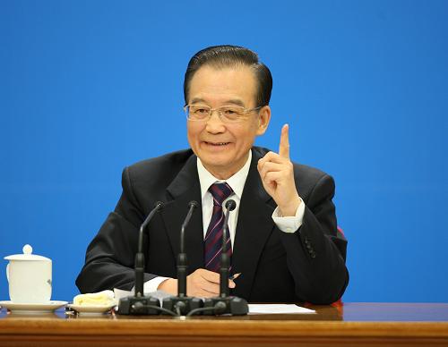 3月14日,國務院總理溫家寶在北京人民大會堂與中外記者見面,并回答記者提問。 新華社記者姚大偉 攝