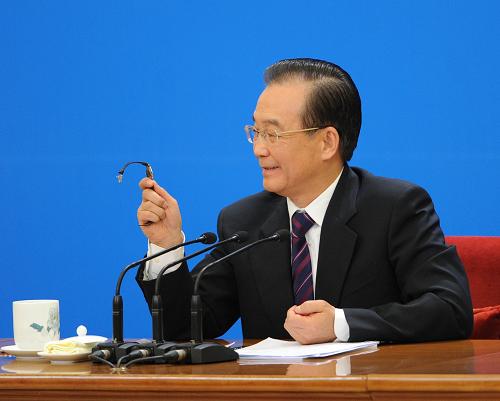 3月14日,國務院總理溫家寶在北京人民大會堂與中外記者見面,并回答記者提問。 新華社記者 王建華 攝