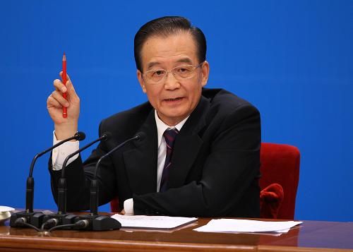3月14日,國務院總理溫家寶在北京人民大會堂與中外記者見面,并回答記者提問。 新華社記者 陳建力 攝