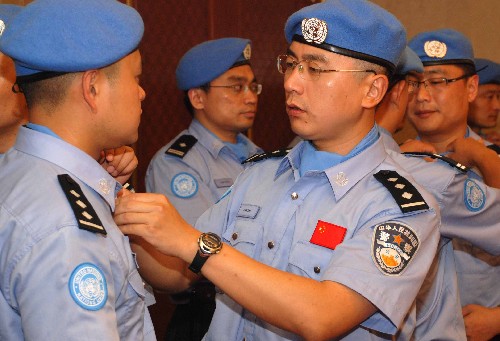 7月11日,公安部赴蘇丹維和警隊民警在北京首都國際機場整裝待發(fā)。新華社發(fā)(賀長山 攝)