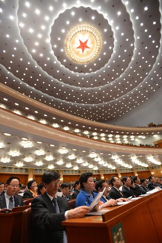 3月10日,十二屆全國人大一次會議在北京人民大會堂舉行第三次全體會議。 新華社記者 王建華 攝