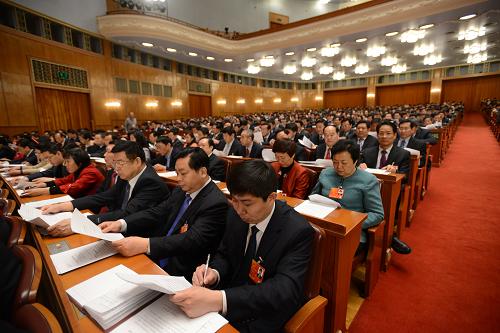 3月10日,十二屆全國人大一次會議在北京人民大會堂舉行第三次全體會議。 新華社記者 王建華 攝