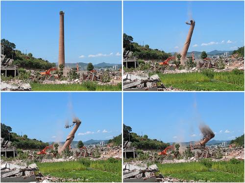 8月9日,在湖北省十堰市鄖縣柳陂鎮(zhèn)大橋村,挖掘機拆除原鄖陽造紙廠煙囪(拼版照片)。湖北省十堰市原鄖陽造紙廠占地近兩萬平米,地處南水北調(diào)水源區(qū)上游,由于制漿造紙廢水排放均不能達標,確定關(guān)停拆除。這也是南水北調(diào)湖北鄖縣庫底清理任務(wù)量最大的一處建筑物。根據(jù)國家南水北調(diào)工程建設(shè)要求,水源地丹江口庫區(qū)庫底清理工作于2012年啟動。2013年8月,國務(wù)院南水北調(diào)辦終驗專家組對丹江口水庫湖北庫區(qū)進行清庫驗收,并給出技術(shù)性驗收合格意見。專家組意見將上報國調(diào)辦專家委員會,待正式驗收合格的行政決定作出后,即可開始蓄水。新華社發(fā)(曹忠宏 攝)