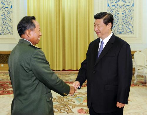 6月21日,中國國家副主席習(xí)近平在北京人民大會堂會見柬埔寨王國副首相兼國防大臣迪班。新華社記者 李濤 攝