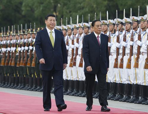 9月26日,中共中央總書記、國家主席習近平在北京人民大會堂同老撾人民革命黨中央總書記、國家主席朱馬里舉行會談。會談前,習近平在人民大會堂東門外廣場為朱馬里舉行歡迎儀式。新華社記者 謝環(huán)馳 攝