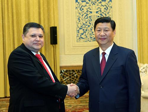 3月30日,國家副主席習(xí)近平在北京人民大會(huì)堂會(huì)見來訪的哈薩克斯坦外長塔任。 新華社記者蘭紅光攝