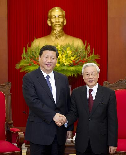 12月21日,正在越南訪問的中共中央政治局常委、國家副主席習(xí)近平在河內(nèi)會見越共中央總書記阮富仲。新華社記者 李學(xué)仁 攝