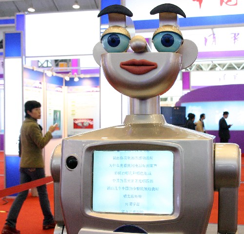 11月16日,具有多種功能的“表情型智能娛樂廣告機器人”亮相展會。當日,為期三天的中國·江蘇首屆產(chǎn)學研合作成果展示洽談會在南京國展中心舉行,250多所高校、科研機構參展。洽談會的展品涵蓋電子信息、裝備制造、新材料、環(huán)保、生物醫(yī)藥等高科技領域。 新華社發(fā)(董金林 攝)