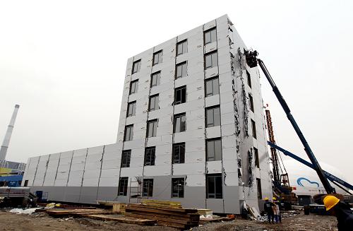 3月9日拍攝的正在建設(shè)中的遠(yuǎn)大館。新華社記者 任瓏 攝