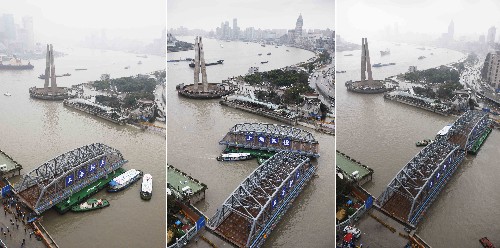 這是2月25日和26日拍攝的外白渡橋“回家”的全過程。 新華社記者裴鑫攝