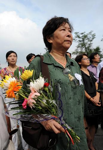 9月3日,抗日航空烈士秦少亭的女兒秦蓉慧在憑吊儀式上。新華社記者孫參攝