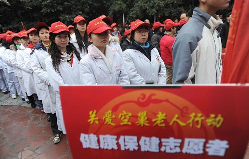 1月22日,健康保健志愿者在啟動儀式上。新華社記者 江宏景 攝