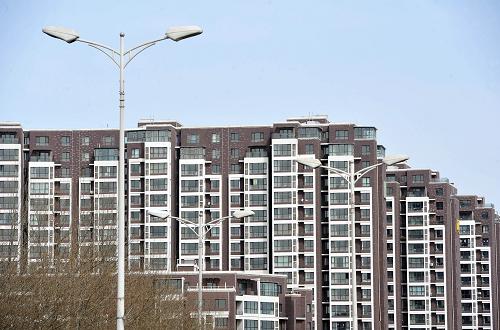 這是位于寧夏回族自治區(qū)銀川市市區(qū)內(nèi)的一處商品房外景(3月18日攝)。新華社記者 彭昭之 攝