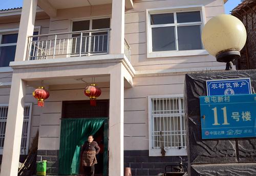 河南省沁陽(yáng)市袁屯村社區(qū)內(nèi)專為低保老人修建的住宅(2012年3月24日攝)。新華社記者 王頌 攝