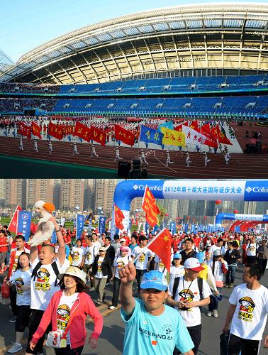 體育事業(yè)成績斐然,全民健身方興未艾。上圖:2013年8月31日,第十二屆全國運動會在沈陽開幕;下圖:2012年5月19日,第十屆大連國際徒步大會,市民揮手致意。新華社記者 楊青 攝