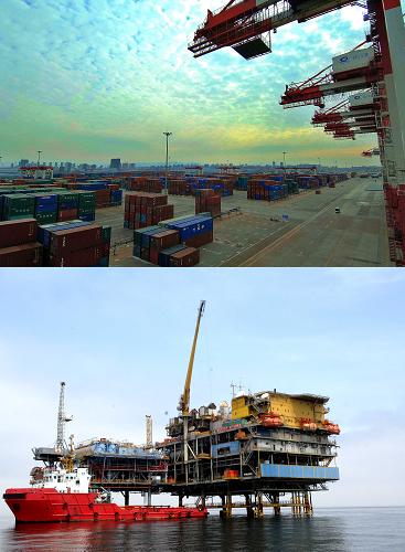 依托港口建設(shè),打造遼寧沿海經(jīng)濟(jì)帶。上圖:營口港集裝箱碼頭(2011年11月24日攝);下圖:渤海綏中海域海上鉆井平臺(2011年7月13日攝)。新華社記者 楊青 攝