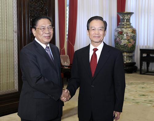 9月20日,中共中央政治局常委、國務(wù)院總理溫家寶在北京中南海紫光閣會(huì)見老撾人民革命黨中央總書記、國家主席朱馬利。新華社記者 丁林 攝