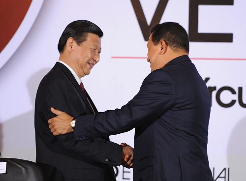 2月17日,國家副主席習(xí)近平和委內(nèi)瑞拉總統(tǒng)查韋斯在加拉加斯共同出席中國和委內(nèi)瑞拉企業(yè)家研討會開幕式。 新華社記者 黃敬文 攝