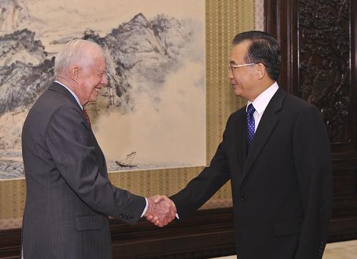 溫家寶會見美國前總統(tǒng)卡特 9月6日,國務院總理溫家寶在北京中南海紫光閣會見美國前總統(tǒng)卡特。 新華社記者黃敬文攝