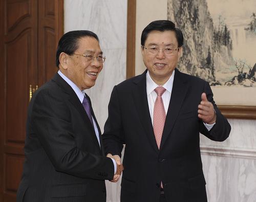 9月27日,中共中央政治局常委、全國人大常委會委員長張德江在北京釣魚臺國賓館會見老撾人民革命黨中央總書記、國家主席朱馬里。新華社記者 謝環(huán)馳 攝