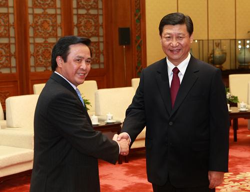 9月30日,中共中央政治局常委、國家副主席習(xí)近平在北京人民大會堂會見越南共產(chǎn)黨中央委員會委員、中央對外部部長黃平君。 新華社記者龐興雷攝
