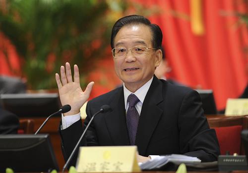 10月20日,政協(xié)十一屆全國委員會常務(wù)委員會第十一次會議在北京開幕。中共中央政治局常委、國務(wù)院總理溫家寶出席開幕會,并作了關(guān)于中共十七屆五中全會會議情況和會議精神的報(bào)告。 新華社記者 謝環(huán)馳 攝