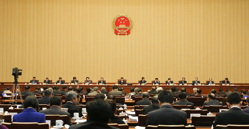 12月21日，十二屆全國人大常委會第十八次會議在北京人民大會堂開幕。張德江委員長主持會議。新華社記者 丁林 攝