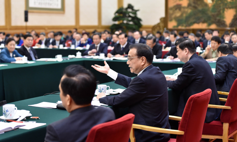 3月6日，中共中央政治局常委、國務院總理李克強參加十二屆全國人大四次會議山東代表團的審議。新華社記者 高潔 攝